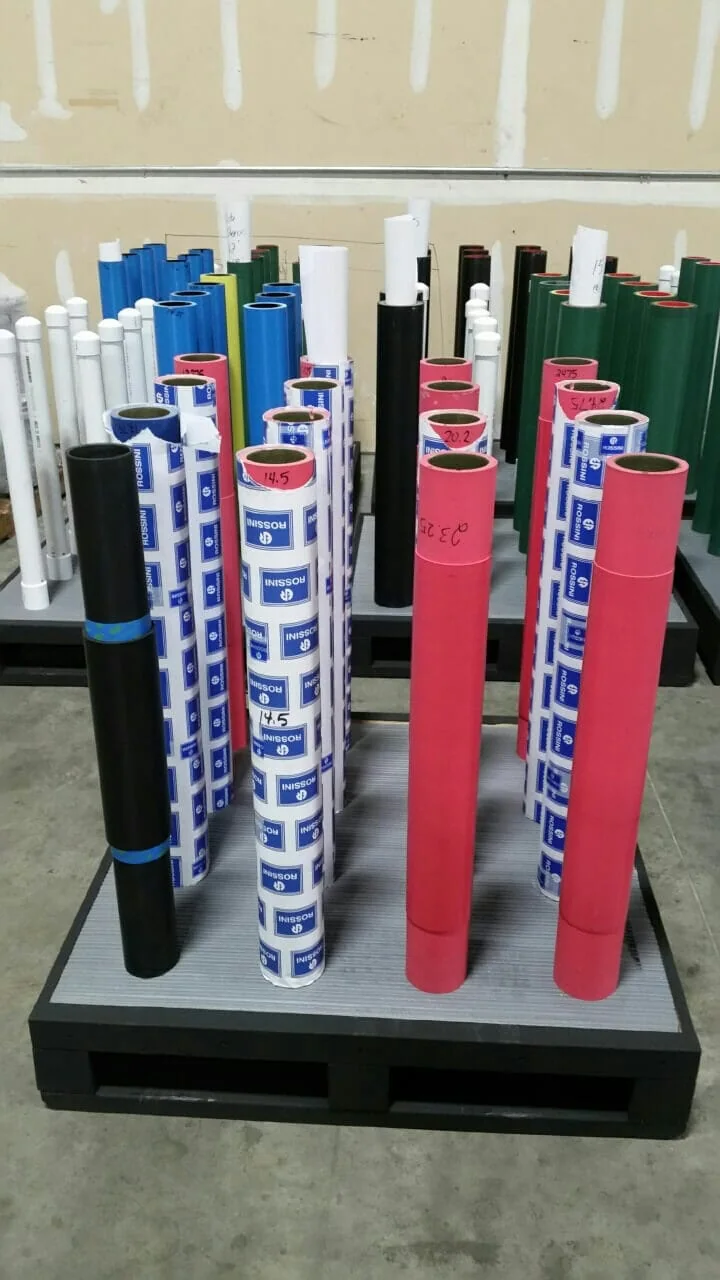 Industrial pipes and tubing organized for machinery moving and heavy rigging services.