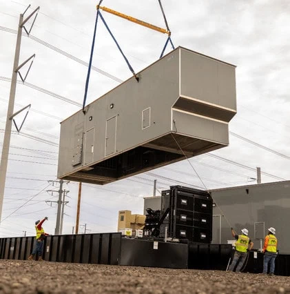 A trailer rigged to move with a large piece of machinery